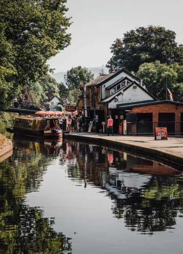People boarding a canal boat.