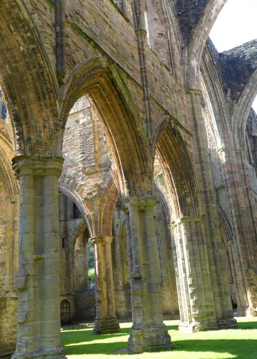 Pillars and arches from the remains of an abbey.