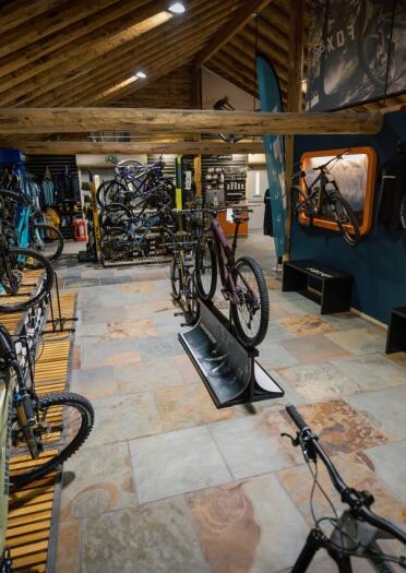A range of mountain bikes on display in a bike shop.