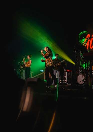 A group of musicians on a stage.