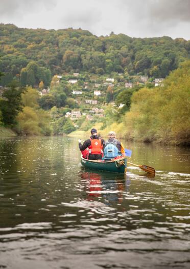Canoeists on a river.
