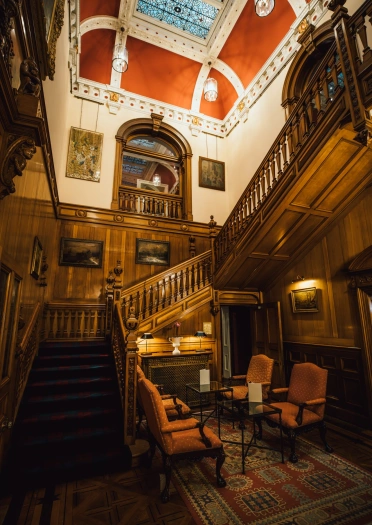 The grand staircase in a luxury hotel.