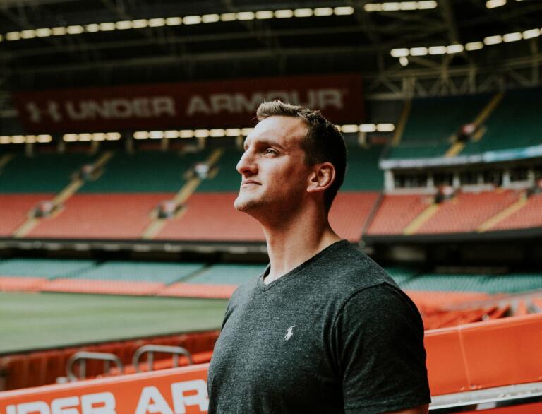 Sam Warburton inside the area looking around at the thousands of seats and pitch.