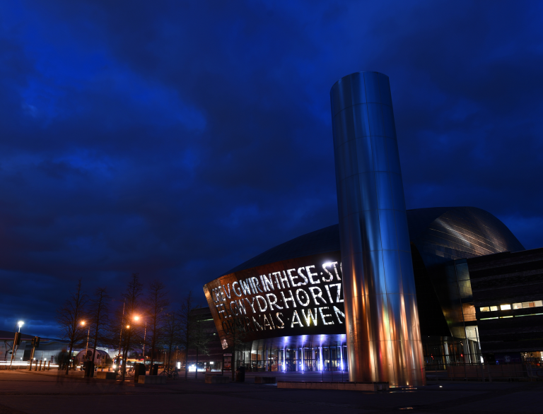 Exterior of Wales Millennium Centre at night.