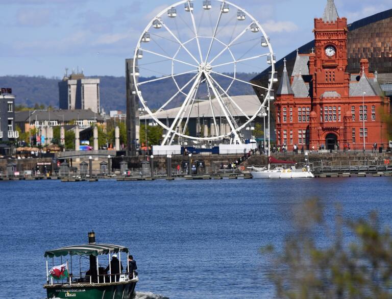 Landscape of Cardiff bay including a big wheel and entertainment centre.
