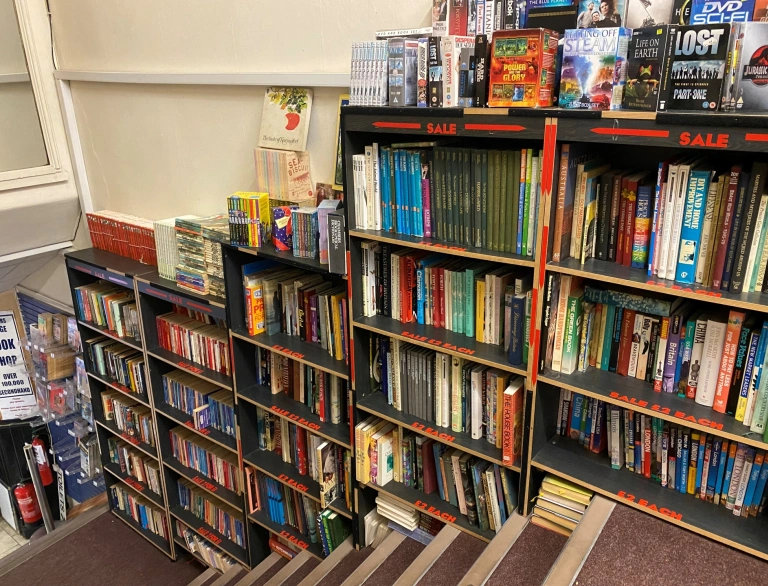 Books on shelves in a shop.