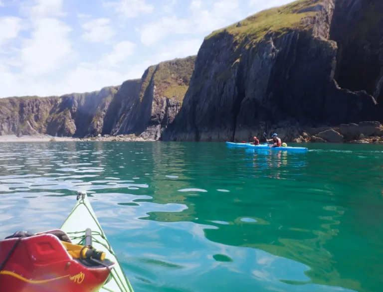 People sea kayaking.