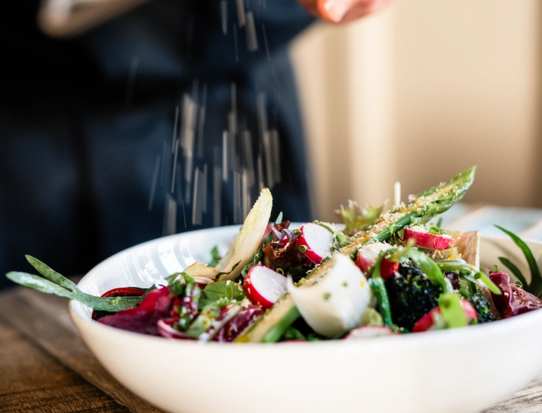 Chef creating a dish at Chapters Restaurant.