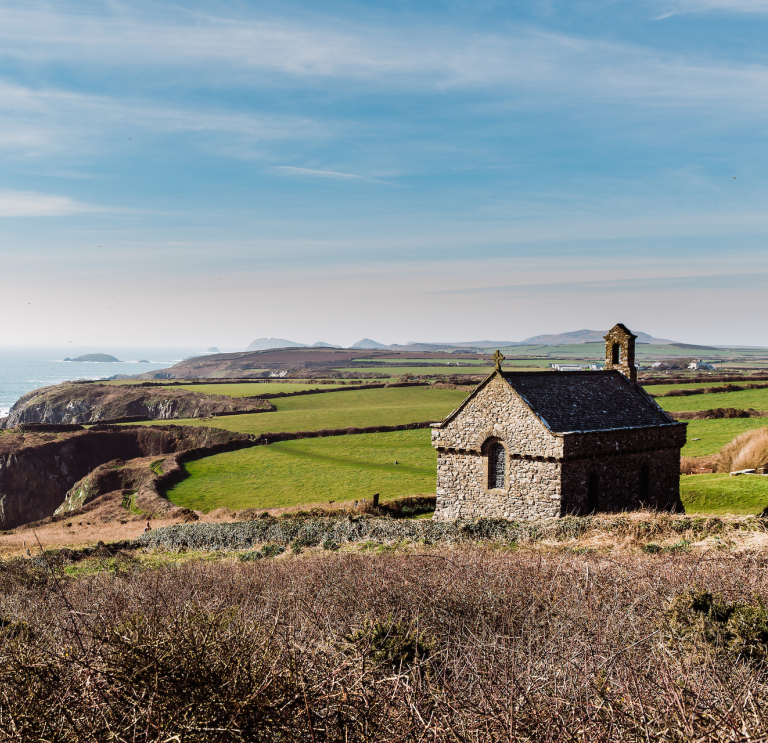 A small chapel overlooking the cliffs and the sea.