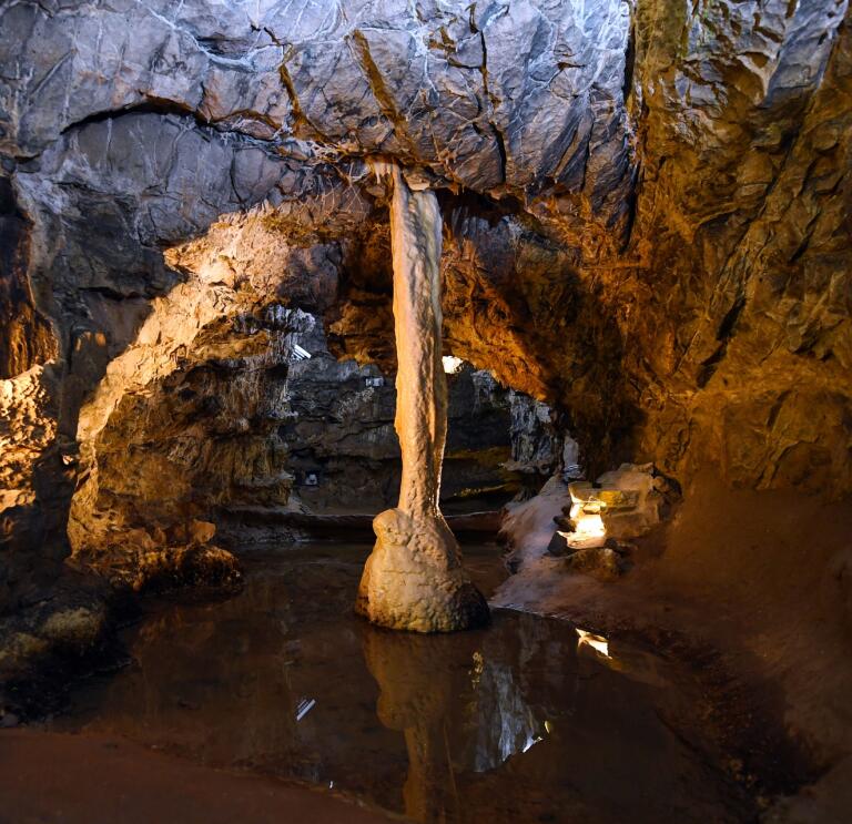 An underground cave lit up.
