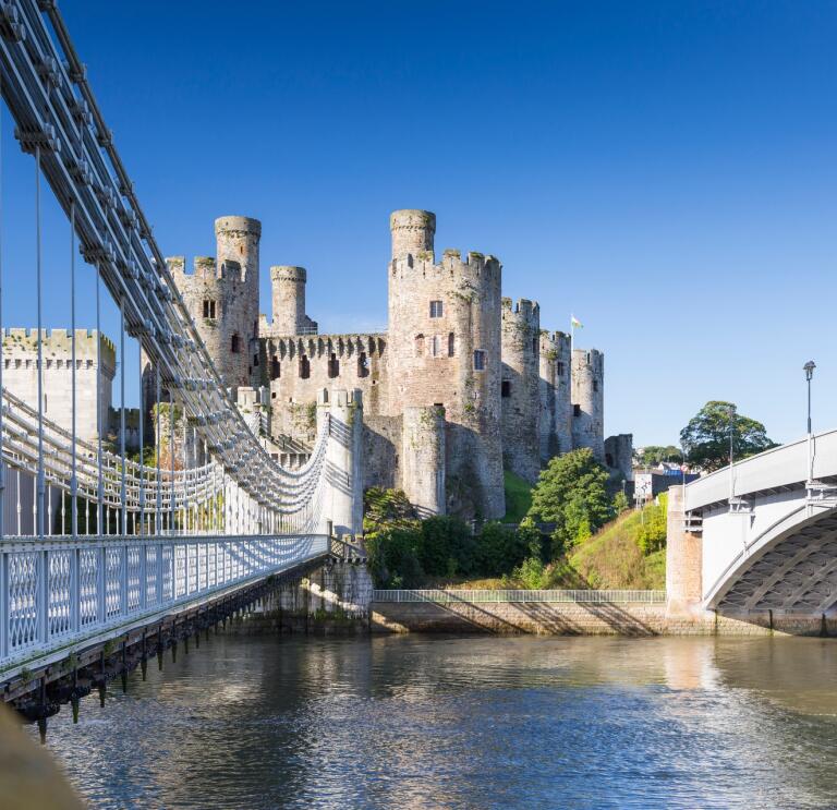 Bridges over a river leading to a castle.