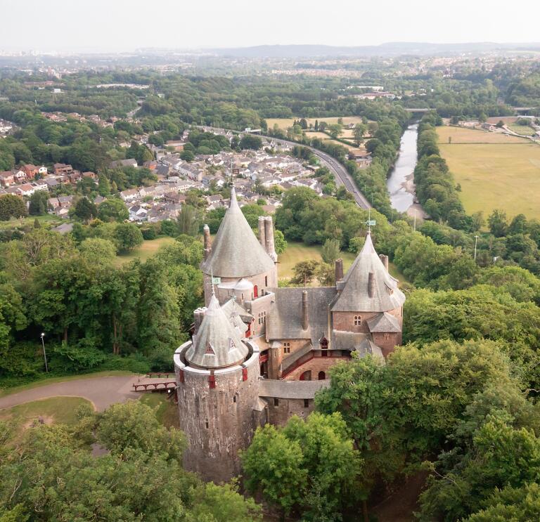 Aerial shot of a fairytale castle.