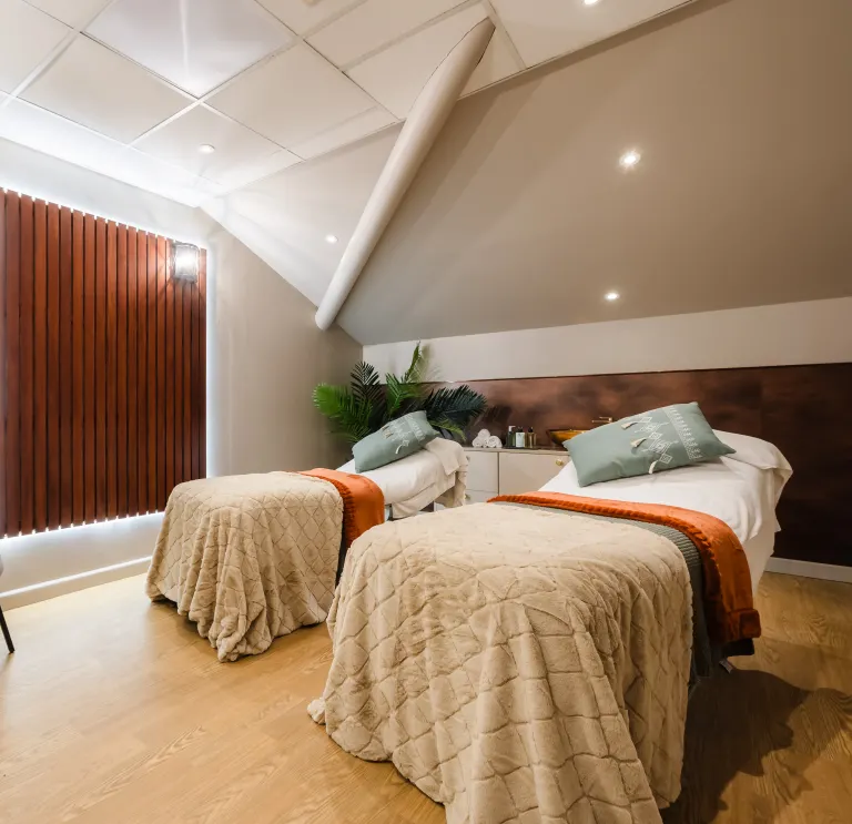 Treatment beds inside a spa resort.