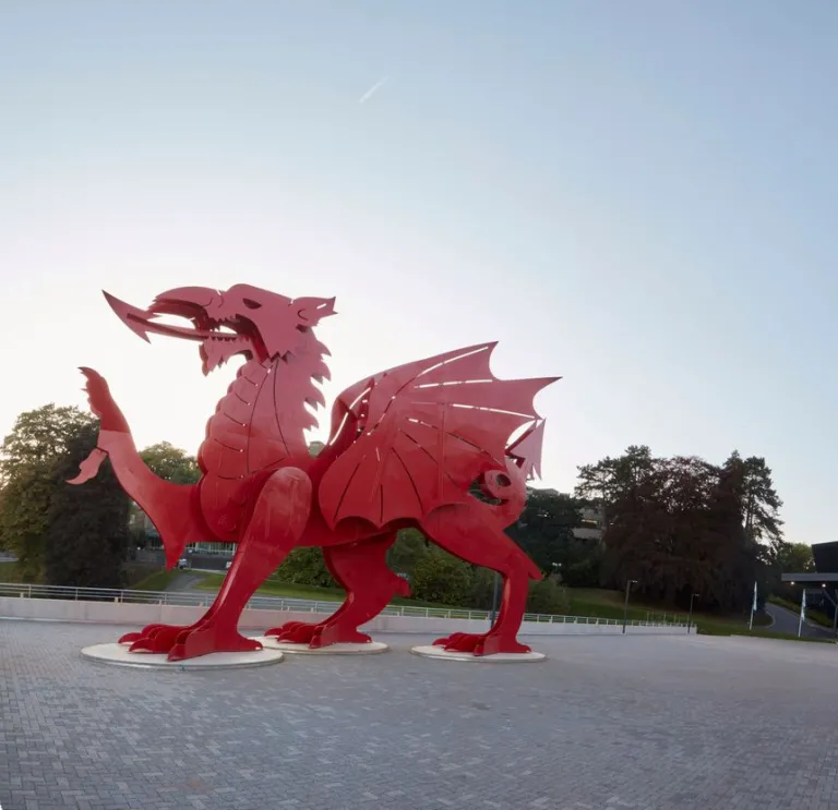 ICC Wales exterior with a large red dragon close up.