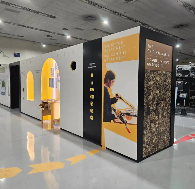 Display boards as part of a tour around a coin making visitor attraction.