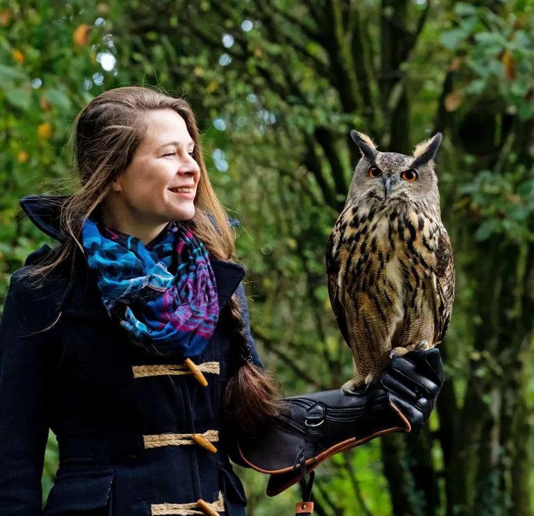 Lady holding an European Eagle Owl 