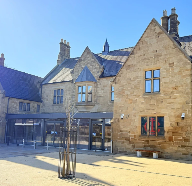 Frontage of a museum in the sunshine