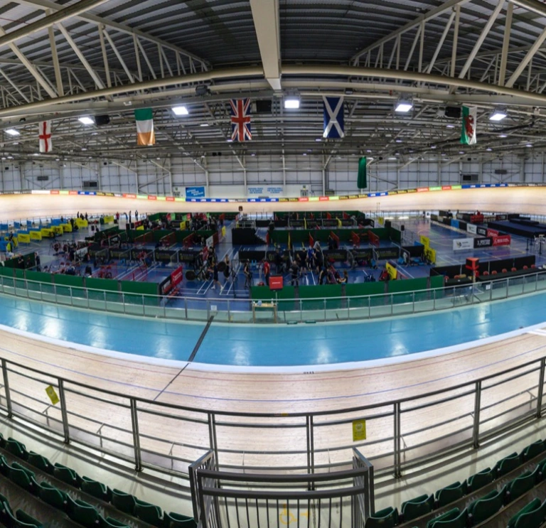 Widescreen shot of a velodrome track.