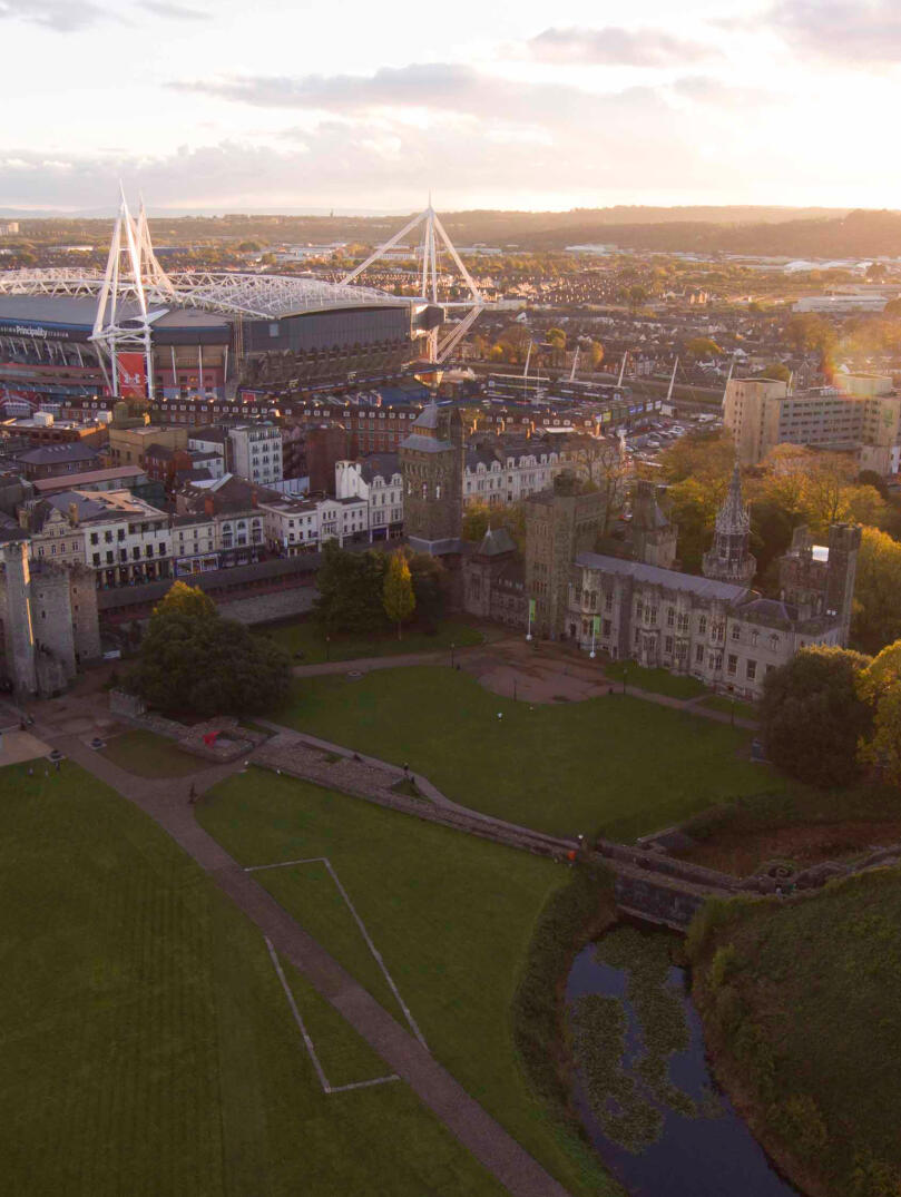 Aerial image of Cardiff with the castle and the stadium in view.
