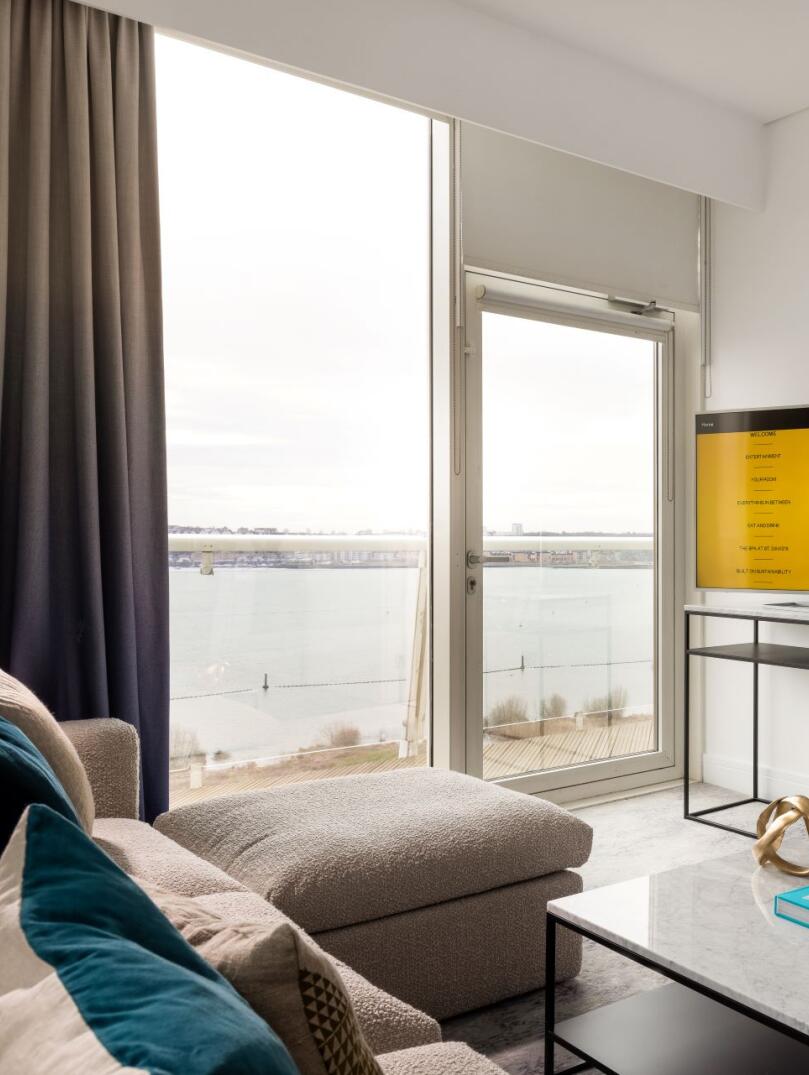 A hotel suite with views of the bay.