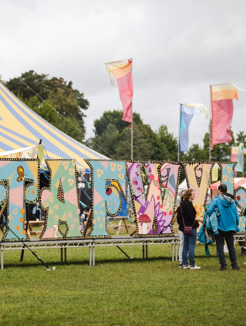 Tafwyl sign and performing tent at the festival.