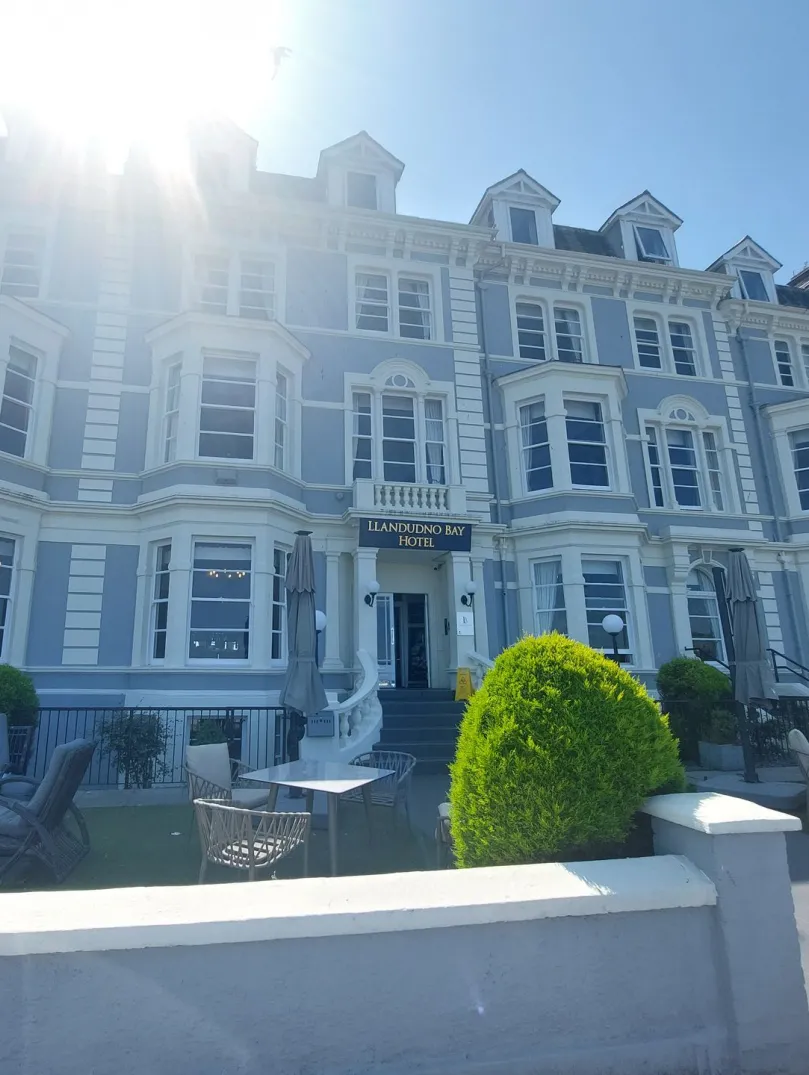 A hotel bathed in glorious sunshine on the seafront.