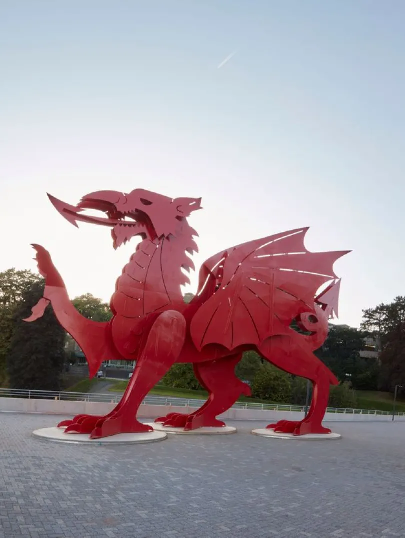 ICC Wales exterior with a large red dragon close up.