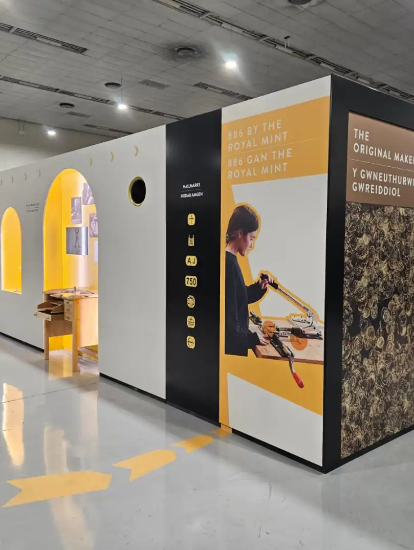Display boards as part of a tour around a coin making visitor attraction.