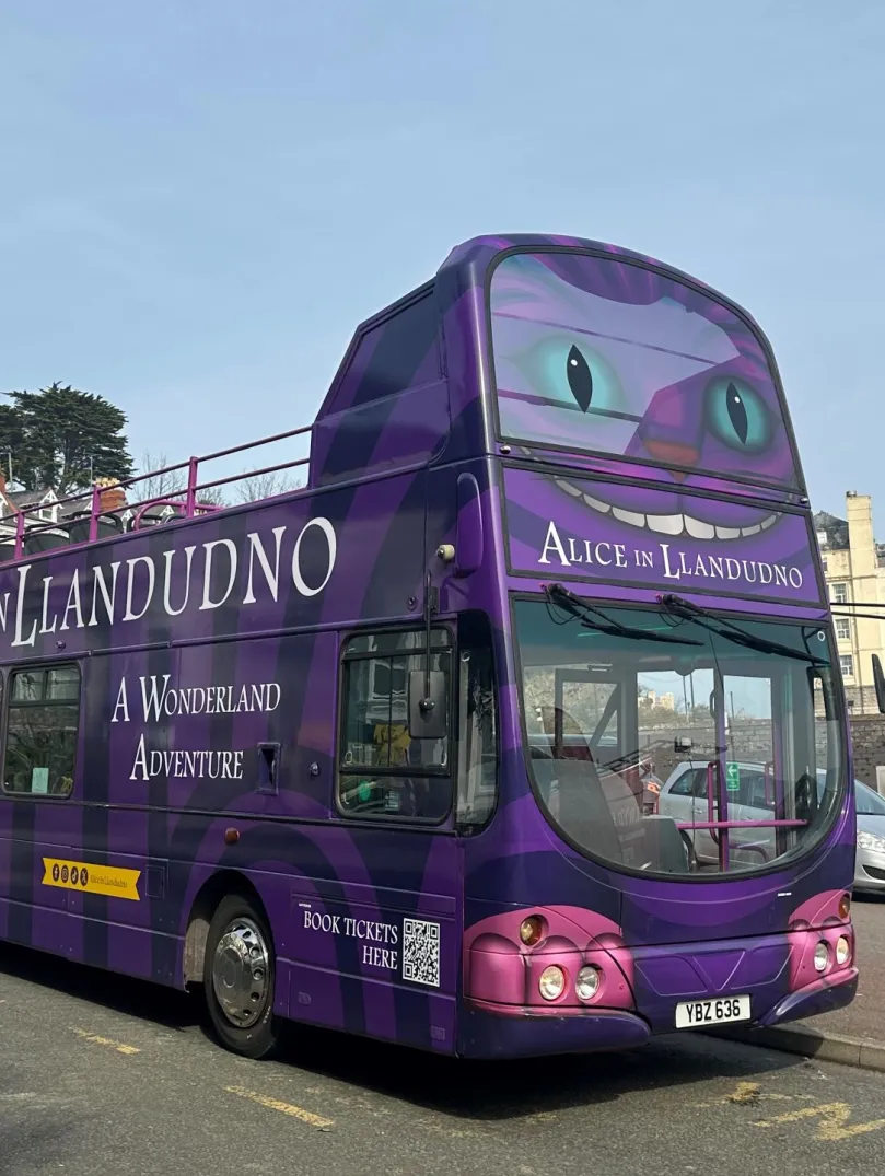A touring open to[ bus for the Alice in Llandudno tour.