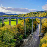 A stunning scenic shot of Pontcysyllte Aqueduct with the river flowing beneath.