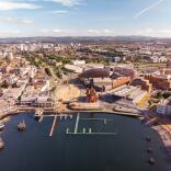 An aerial view of all the attractions and waterfront at Cardiff Bay.