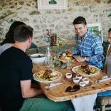 Group of people dining at a restaurant.