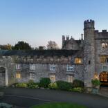 Evening Exterior shot of historic hotel.