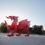 ICC Wales exterior with a large red dragon close up.