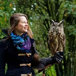 Lady holding an European Eagle Owl