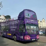 A touring open to[ bus for the Alice in Llandudno tour.