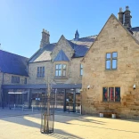 Frontage of a museum in the sunshine