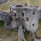 Aerial shot of the ruins of a castle.