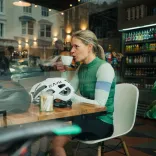 Cyclists having a coffee in a cafe.